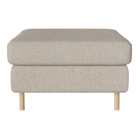 Light beige ottoman with a textured fabric and natural wood legs, featuring a simple, modern design.