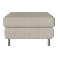 Beige upholstered ottoman with a soft texture, featuring a minimalist design and sleek silver legs.