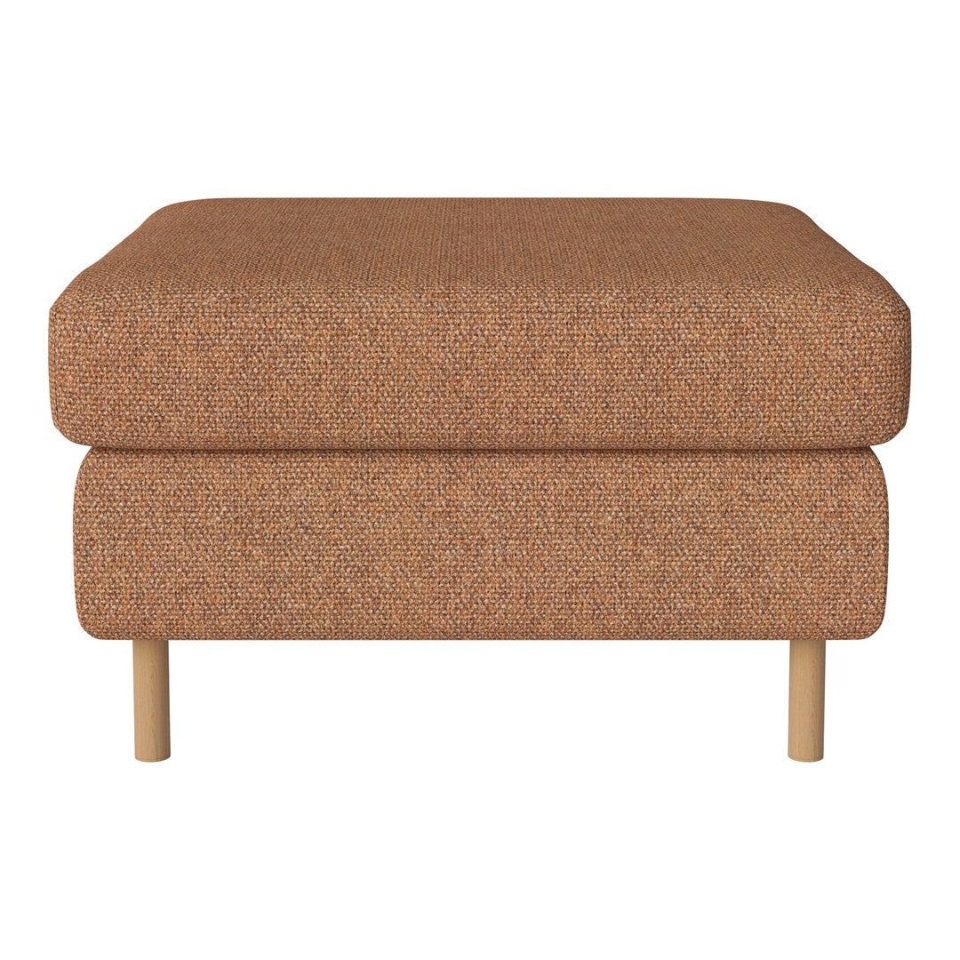 "Textured orange ottoman with light wooden legs, offering a warm, cozy vibe for any living space."