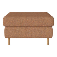 "Textured orange ottoman with light wooden legs, offering a warm, cozy vibe for any living space."