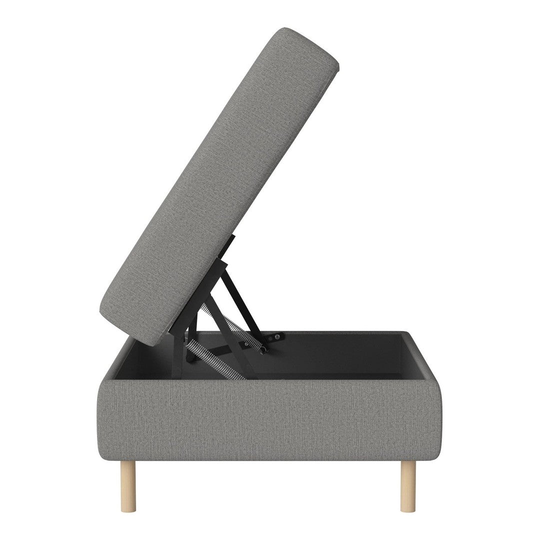 Gray upholstered storage bed with light wood legs and textured fabric pattern, showcasing modern minimalist design.