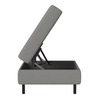 Gray upholstered storage bed with a clean, minimalist design and subtle textured pattern.