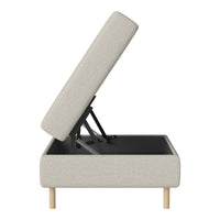 Light grey upholstered storage ottoman with a minimalist design and natural wooden legs, featuring a sleek, solid top.
