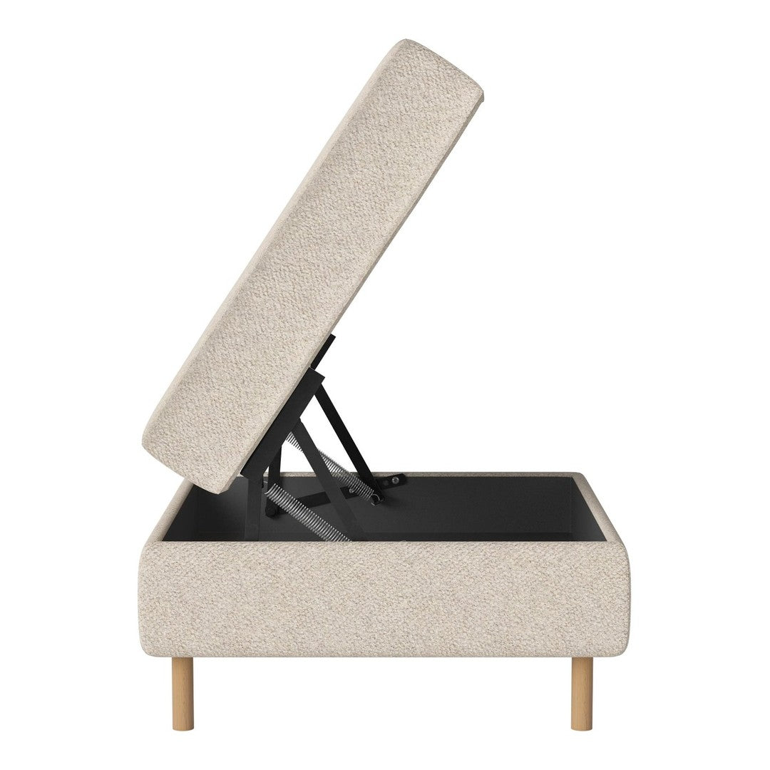 Beige upholstered storage bed with a sleek, textured pattern and light wooden legs, featuring an open, lifting top.