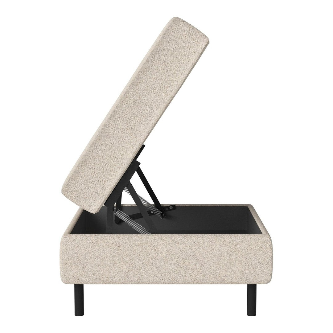 Beige upholstered storage ottoman with a minimalist design, featuring a textured fabric and black metal legs.