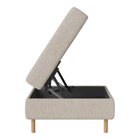 Beige upholstered ottoman with a minimalist design, featuring a textured fabric and natural wood legs.