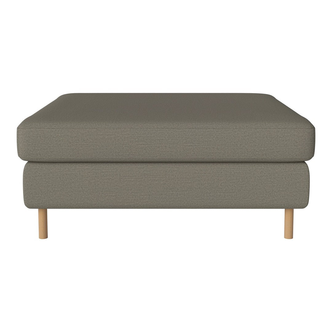 Gray upholstered ottoman with a smooth texture and light wooden legs, perfect for modern living spaces.