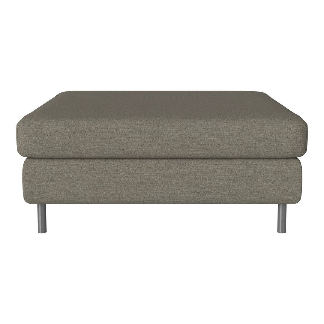 Taupe upholstered ottoman with a smooth, solid pattern and sleek metal legs for a modern, minimalist look.
