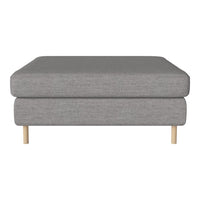 Gray upholstered ottoman with a clean, minimalist design and natural wood legs, perfect for modern decor.
