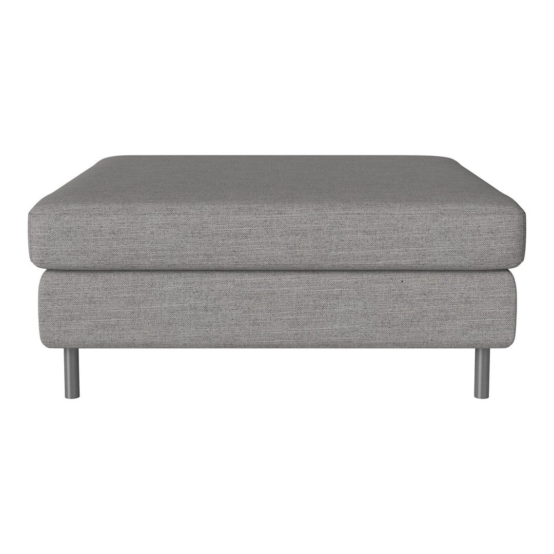 Gray upholstered ottoman with a clean, modern design and subtle texture. Ideal for contemporary living spaces.