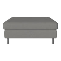 Gray upholstered ottoman with textured fabric and sleek metal legs, perfect for modern living spaces.