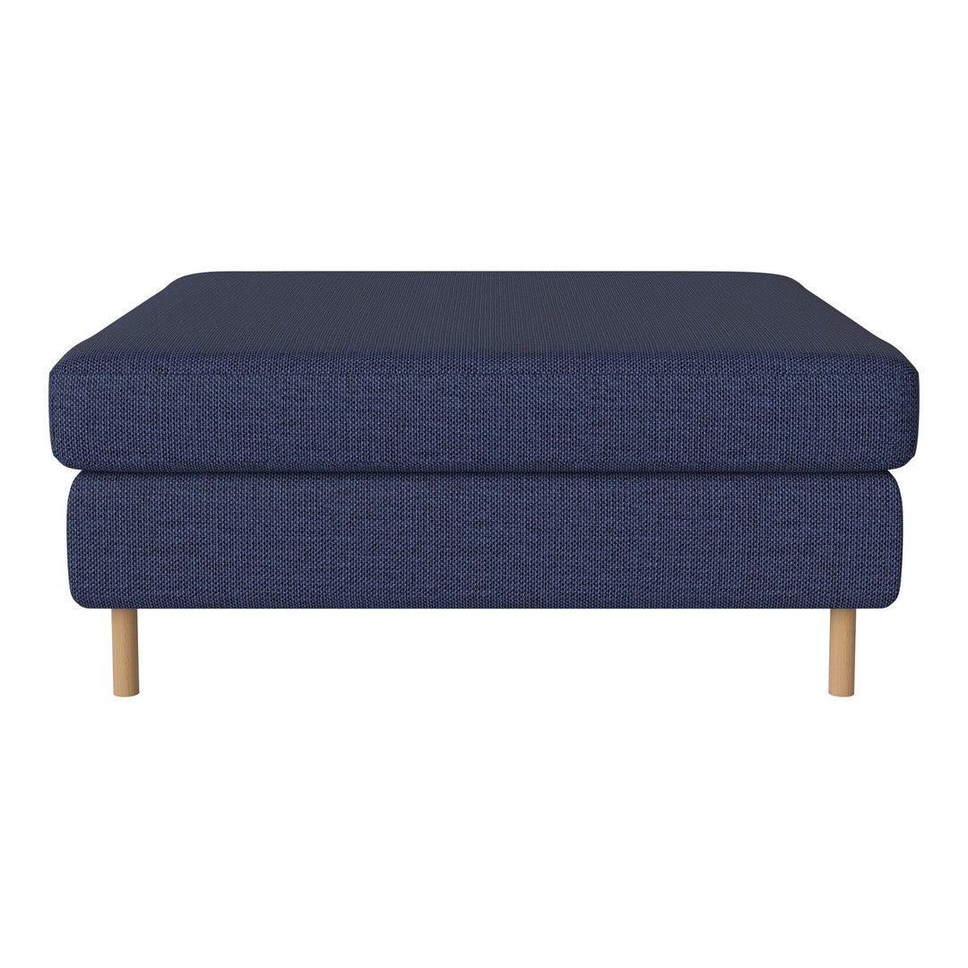 Textured navy blue ottoman with a sleek design and natural wood legs. Perfect for modern interiors.