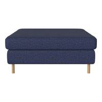Textured navy blue ottoman with a sleek design and natural wood legs. Perfect for modern interiors.