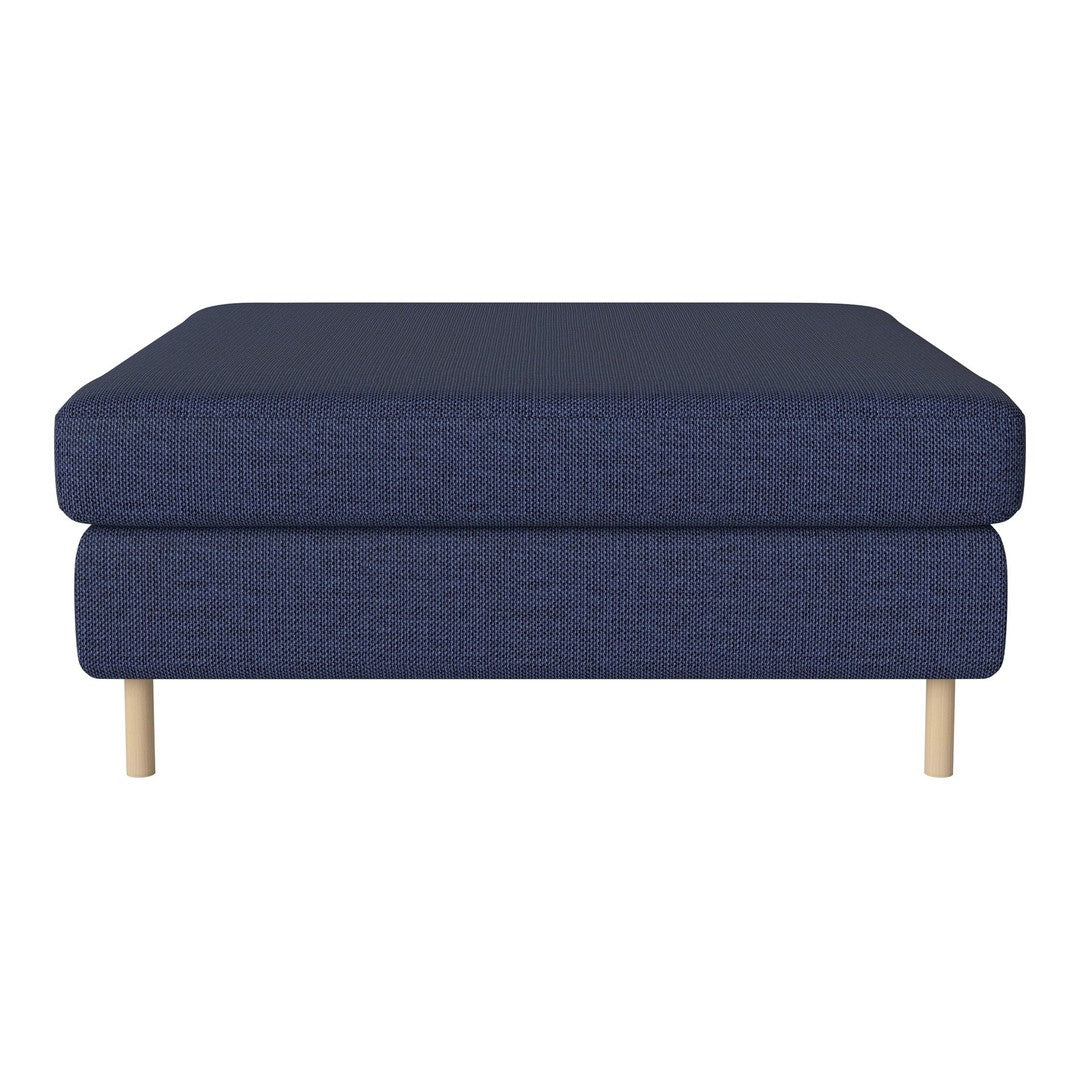 Navy blue upholstered ottoman with a textured finish and light wood legs, perfect for modern decor.