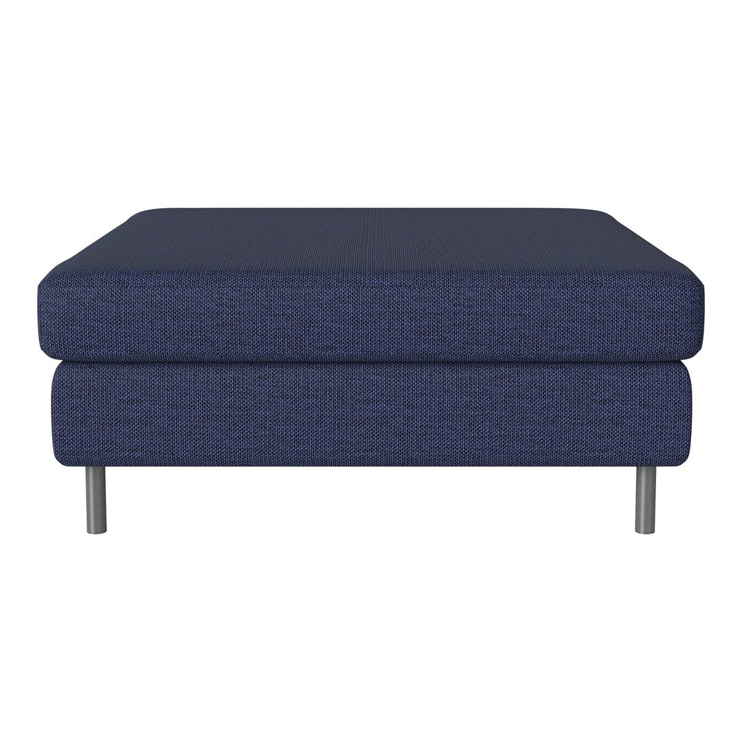 Navy blue upholstered ottoman with a textured pattern and silver legs. Modern design for versatile decor.
