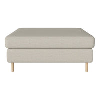 Light beige upholstered ottoman with clean lines and natural wood legs. Perfect for modern decor.