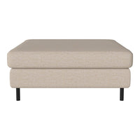 Beige fabric ottoman with a smooth texture and minimalist design, complemented by sleek black legs. 
