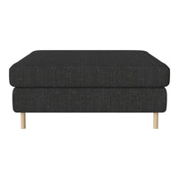 Dark gray upholstered ottoman with a textured pattern and wooden legs.