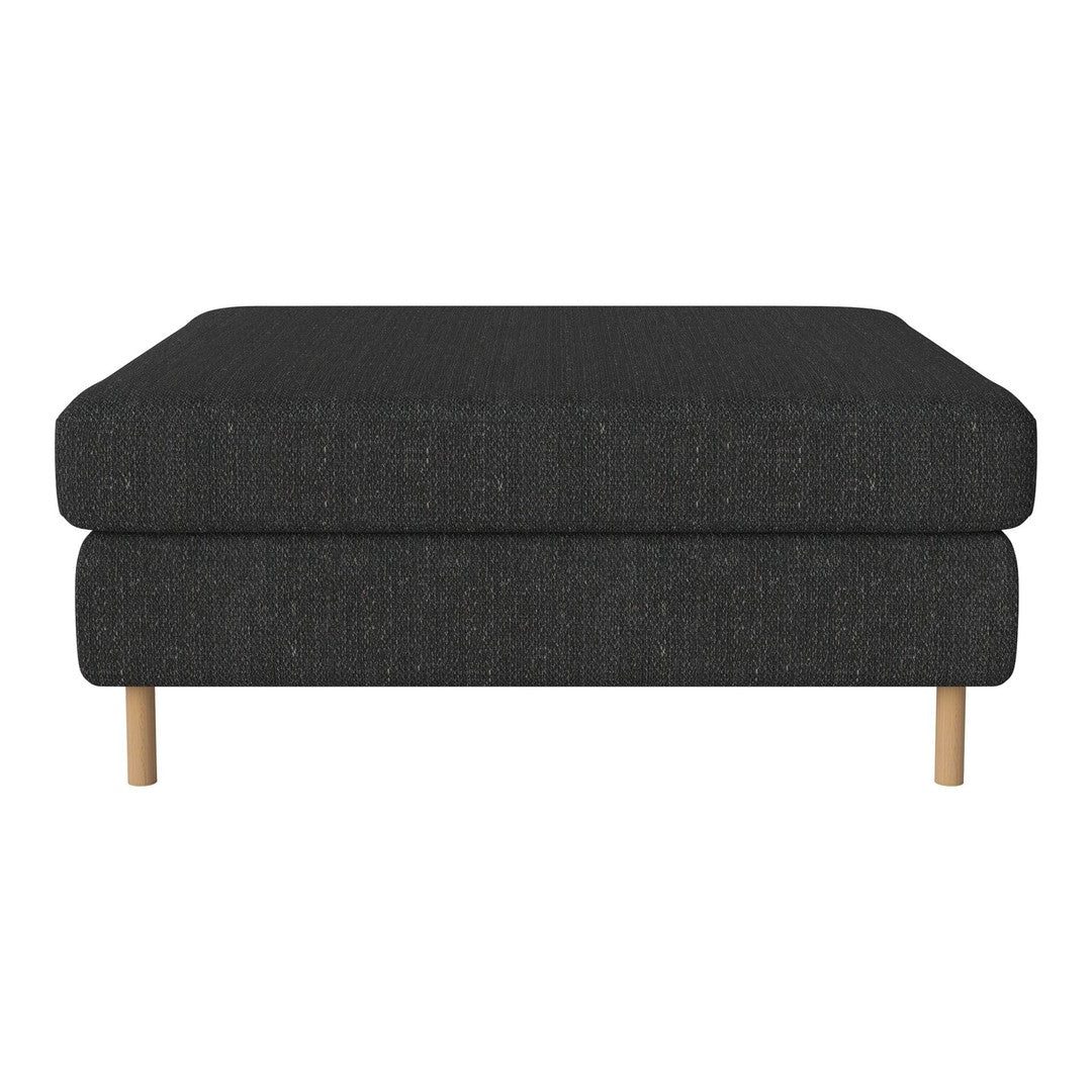 Dark gray upholstered ottoman with a simple, modern design and light wooden legs. Ideal for any contemporary decor.