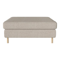 Light beige upholstered ottoman with a textured pattern and natural wood legs, offering a modern and neutral aesthetic.