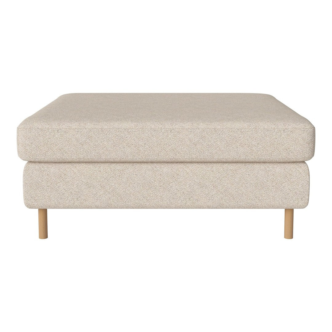 Cream-colored ottoman with a textured pattern and light wood legs, adding a modern touch to any space.