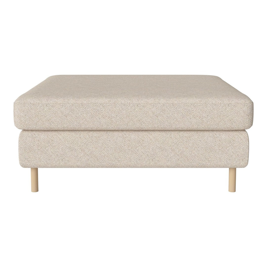 Beige upholstered ottoman with subtle texture and natural wood legs for a minimalist aesthetic.