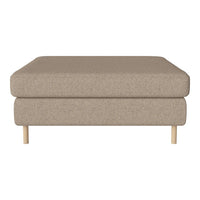 Beige ottoman with a textured fabric, featuring a minimalist design and natural wood legs. Ideal for modern interiors.