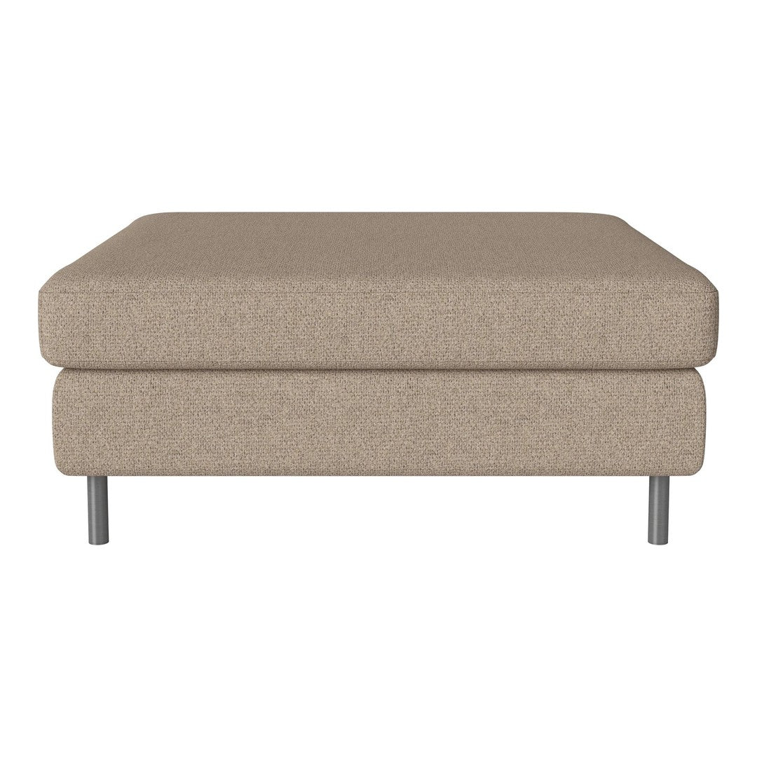 Beige upholstered ottoman with a smooth texture and minimalist design, featuring sleek metal legs.