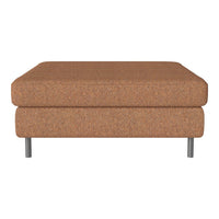 Brown upholstered ottoman with a smooth texture and modern metal legs. Perfect for contemporary living spaces.