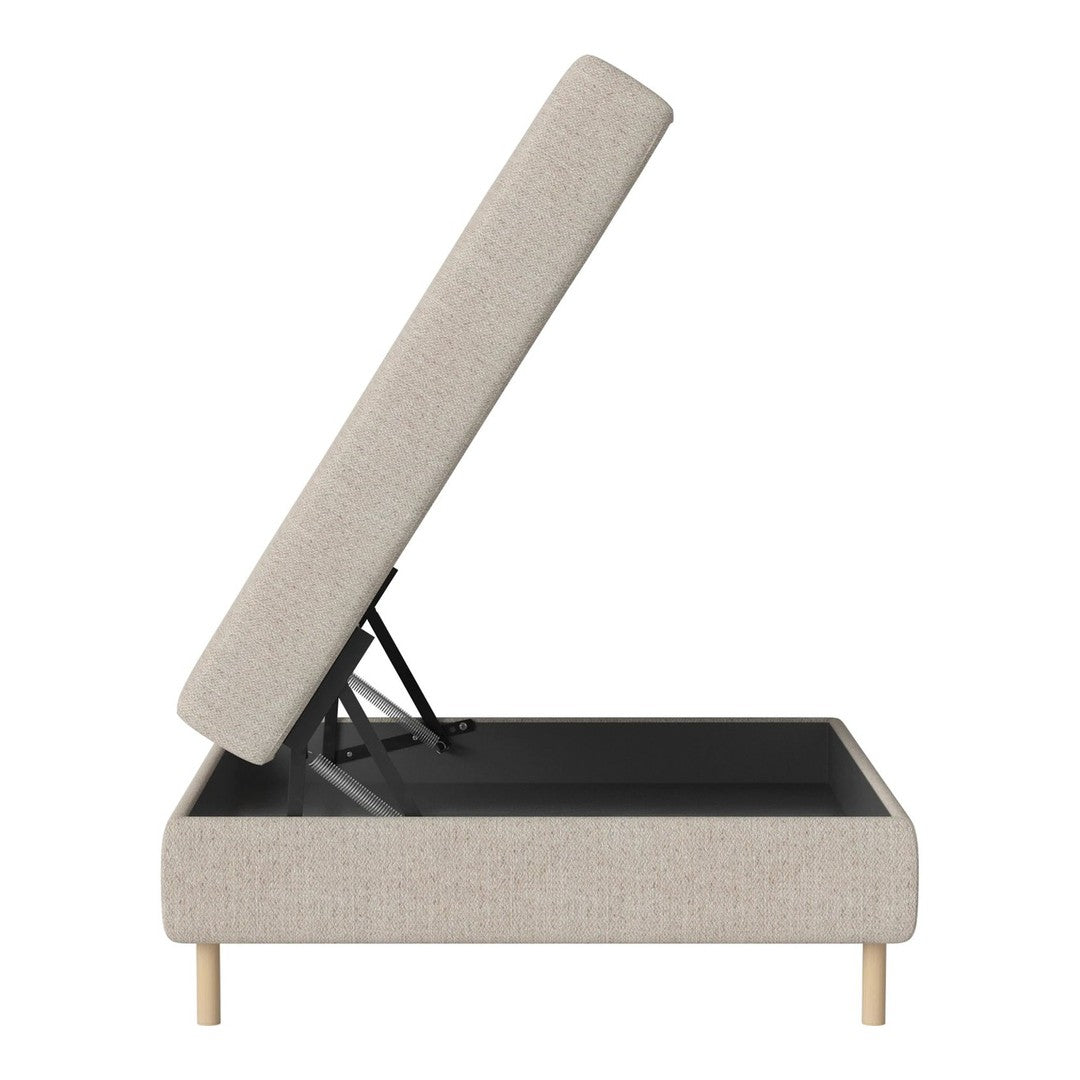 Light beige upholstered storage bed with a minimalist design and wooden legs, featuring a simple, modern pattern.