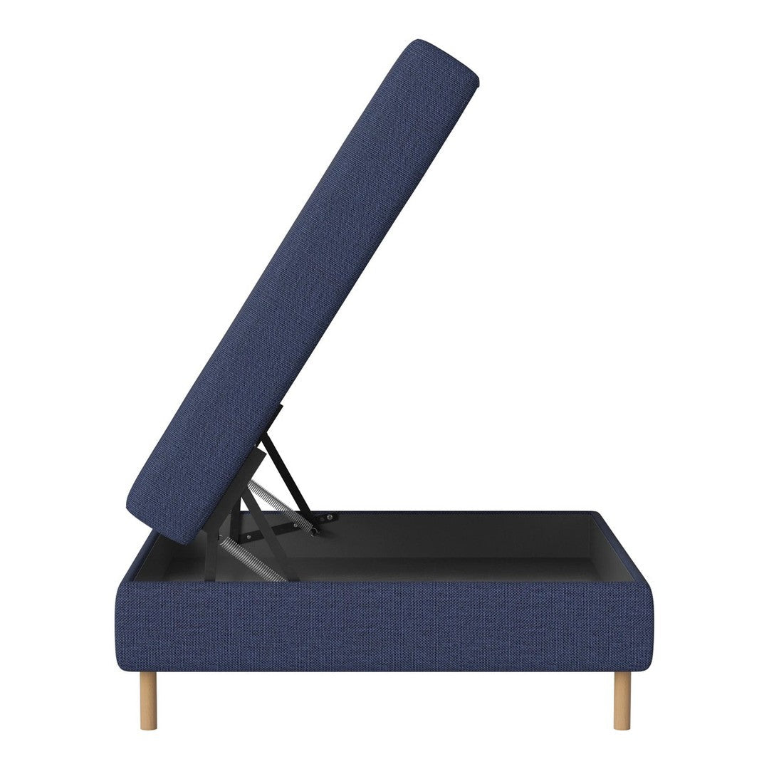 Blue upholstered storage bed with a textured pattern and natural wood legs, partially open to reveal interior space.