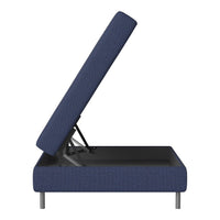 Navy blue upholstered storage bed with textured fabric and modern metal legs, showcasing a sleek, contemporary design.
