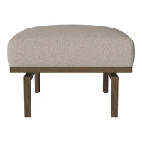 Cream textured upholstery with a smooth, rounded shape, supported by a dark wood frame.