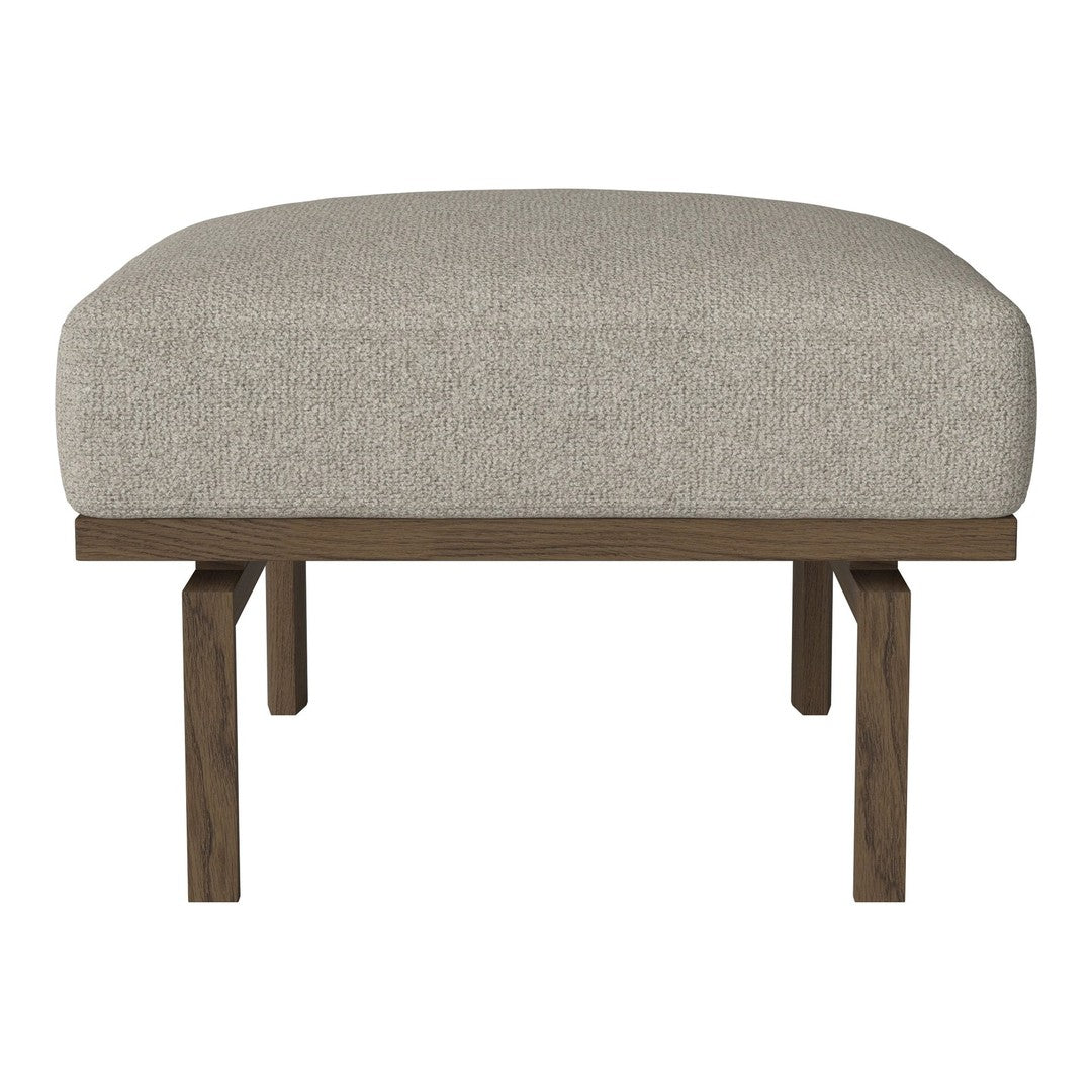 Light gray fabric ottoman with a smooth texture, featuring a simple wooden frame. Ideal for modern decor.