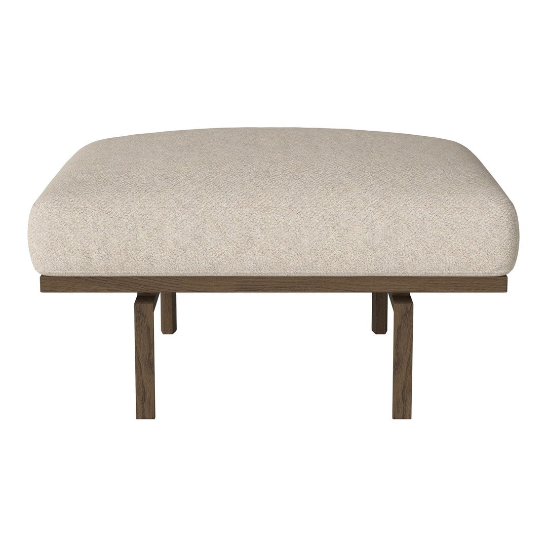 Light beige upholstered stool with a smooth, solid fabric pattern and contrasting dark wooden legs.