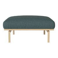 Teal upholstered ottoman with a textured pattern and light wood legs, perfect for modern decor.