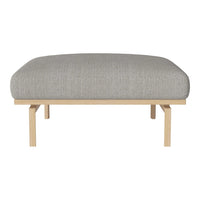 Gray textured upholstery on a minimalist wooden bench with clean lines and natural finish.