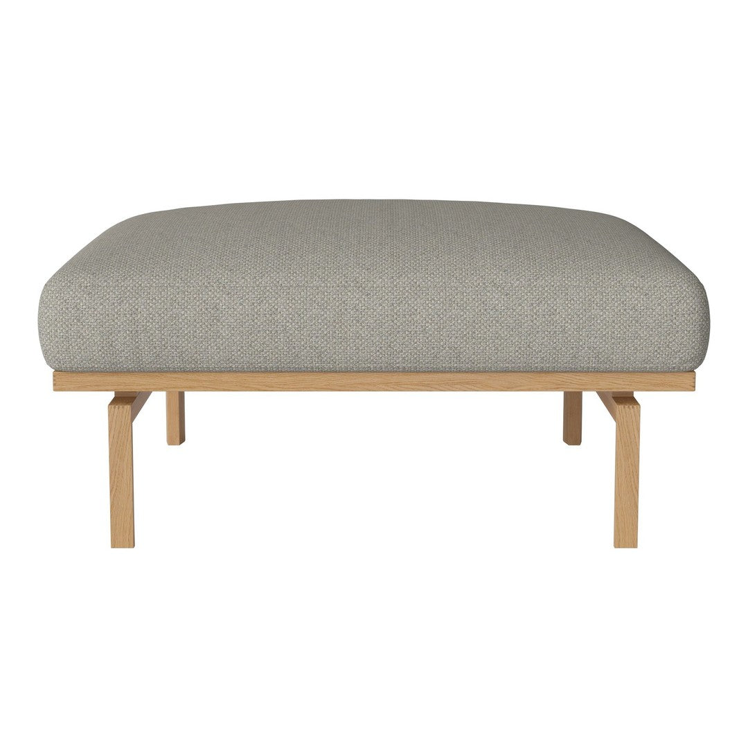 Light gray upholstered cushion on a natural wood frame with clean lines and minimalistic design.