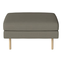 Gray upholstered ottoman with a textured fabric and light wood legs, featuring a modern minimalist design.