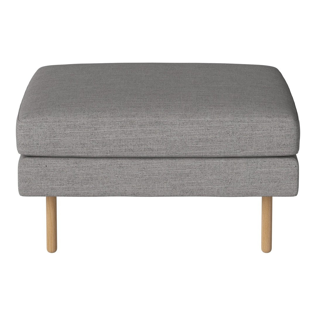 Gray upholstered ottoman with a smooth texture and simple design, featuring natural wood legs.