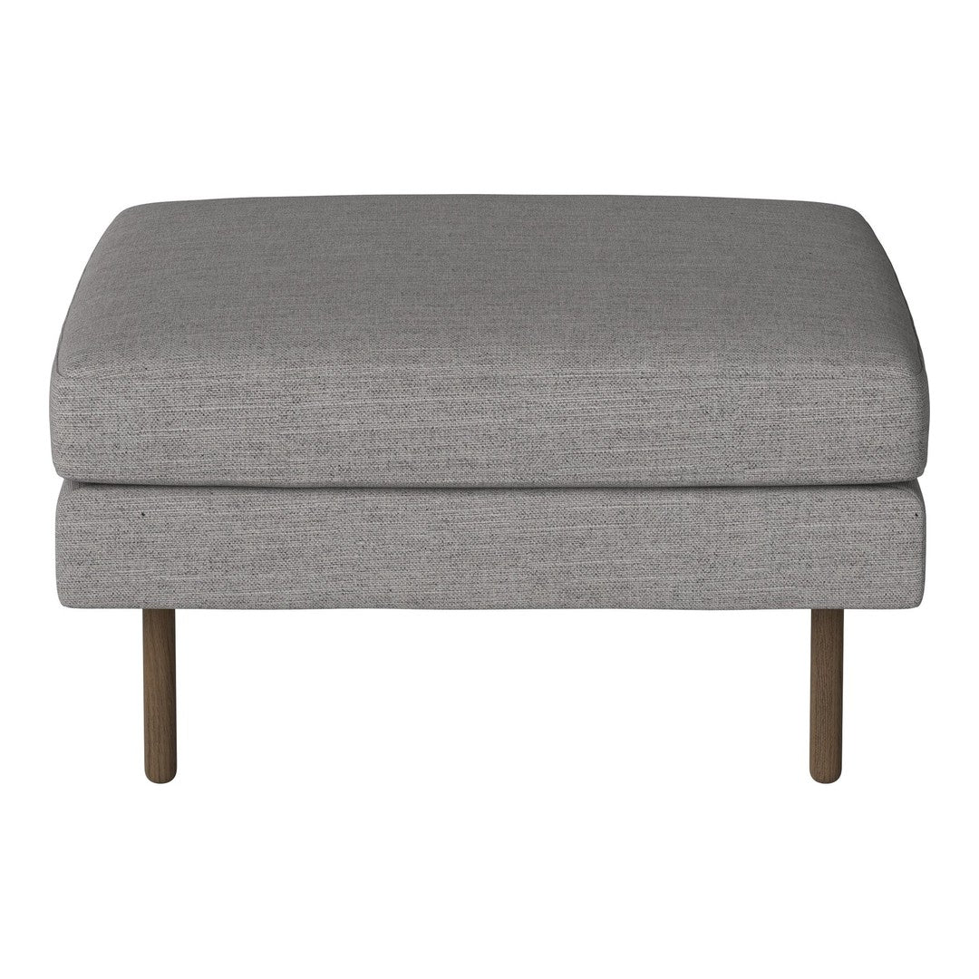 Gray upholstered ottoman with a smooth texture and minimalist design, featuring slender metal legs.