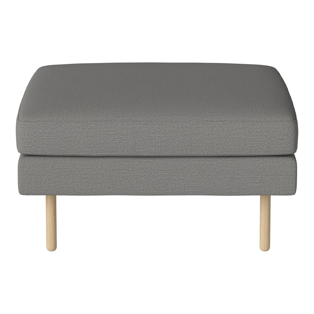 Gray upholstered ottoman with a textured pattern and light wooden legs, offering a modern and minimalist look.