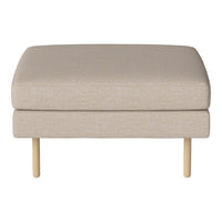 Beige ottoman with a smooth fabric texture and light wooden legs, ideal for modern decor.