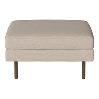 Beige upholstered ottoman with a simple, smooth texture and minimalist design on slender metal legs.