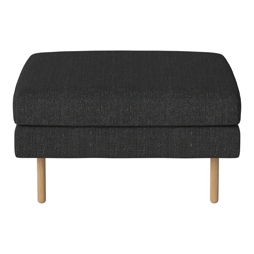 Black upholstered ottoman with a textured finish and natural wooden legs. Simple, modern design for versatile home decor.