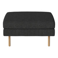 Dark gray upholstered ottoman with a subtle textured pattern and light wooden legs. Modern and stylish decor accent.