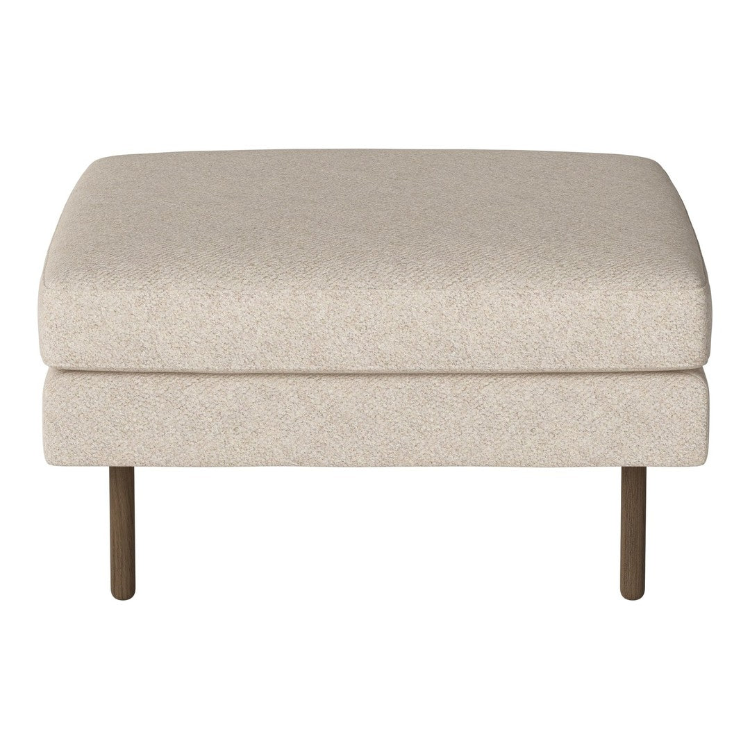 Light beige ottoman with a textured upholstery and simple metal legs, perfect for modern decor.