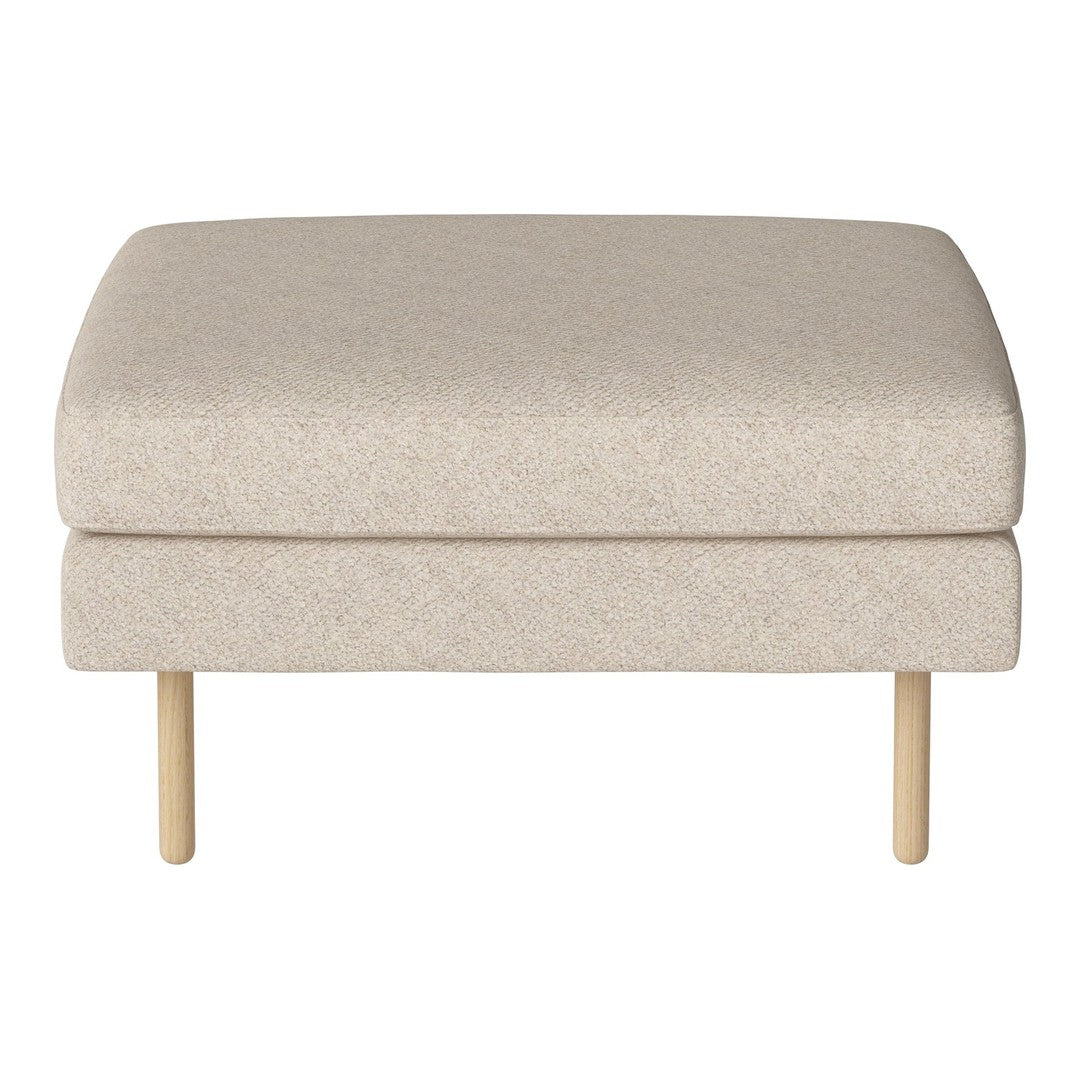 Light beige ottoman with a subtle textured pattern and natural wood legs, perfect for any living space decor.