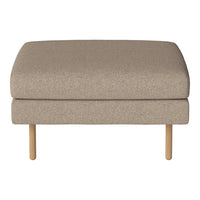 Beige upholstered ottoman with a smooth texture and light wooden legs, showcasing modern minimalism.