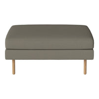 Gray upholstered ottoman with a smooth texture and natural wood legs, perfect for modern living spaces.